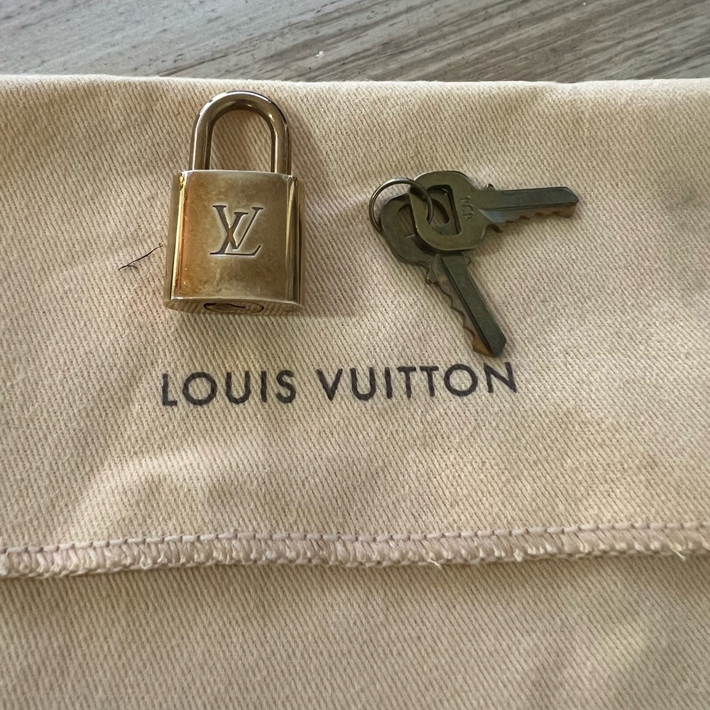 Louis Vuitton brass lock and keys